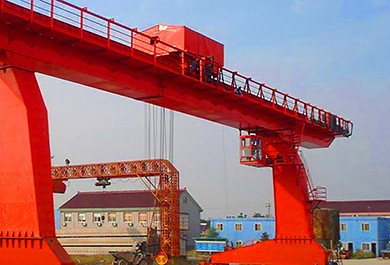 Red gantry bridge crane outdoors